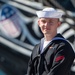 FN Skyler Brooks poses for a photo in front of USS Constitution.