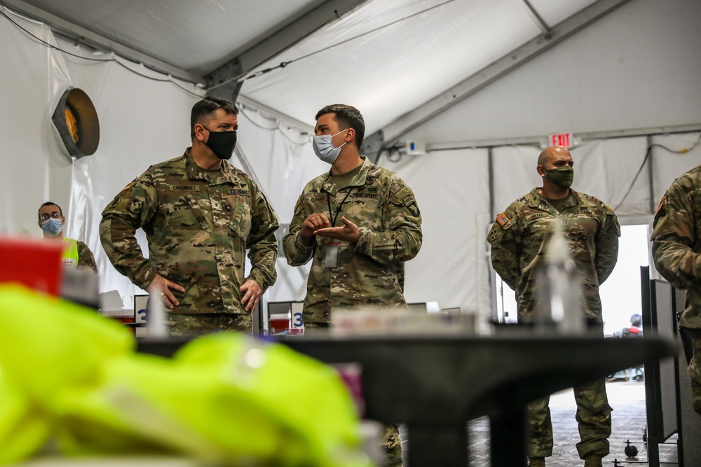 U.S. Army Brigadier General Paul Chauncey, III, Joint Force Land Component Command deputy commanding general visits the United Center COVID-19 Community Vaccination Center, Chicago