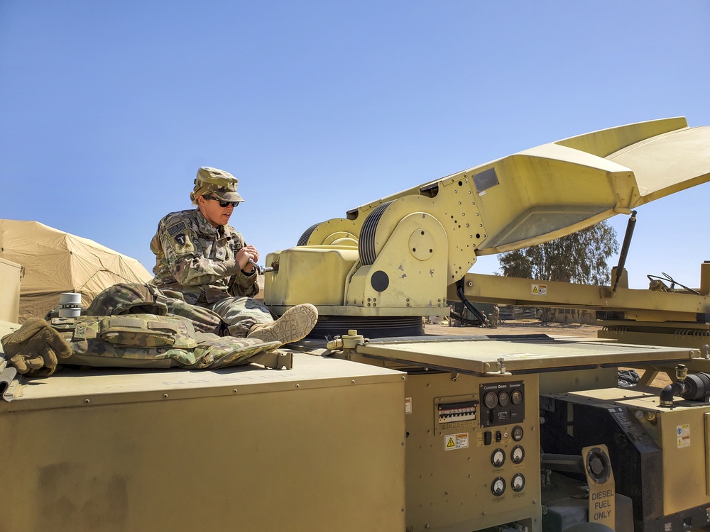 Kyle Texas Soldier Assembles Satelite Truck Dish in Jordan