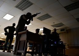 NAF El Centro Sailors refine marksmanship skills with new weapons simulator