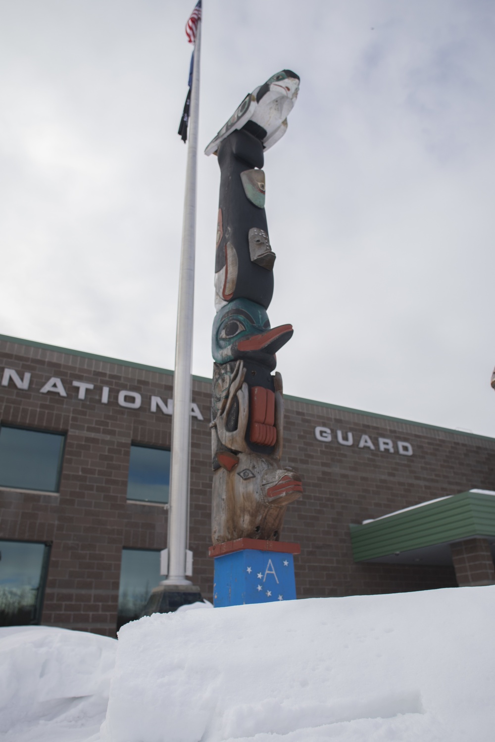 Alaska National Guard armory honor pole restored by Vietnam veteran and son