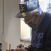 Alaska National Guard armory honor pole restored by Vietnam veteran and son