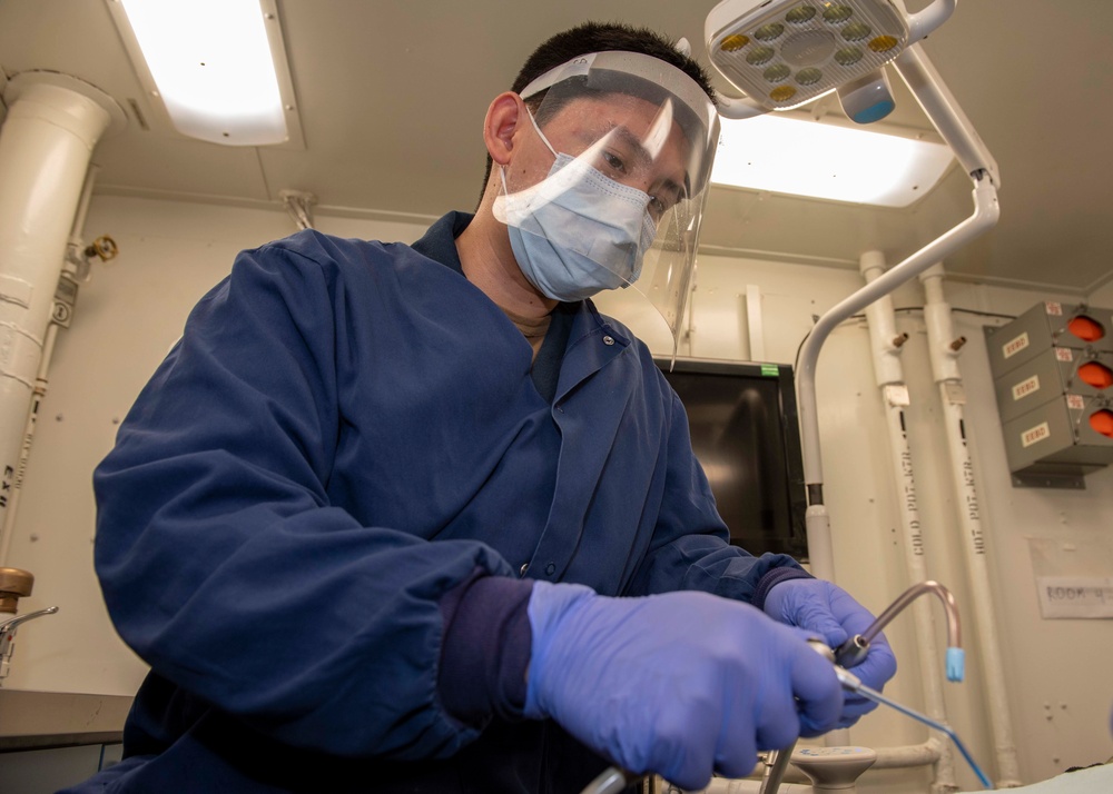 GHWB Sailor Assist In Teeth Cleaning