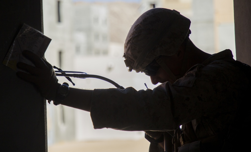 Marines with 3/7 clear buildings at the Combat Center