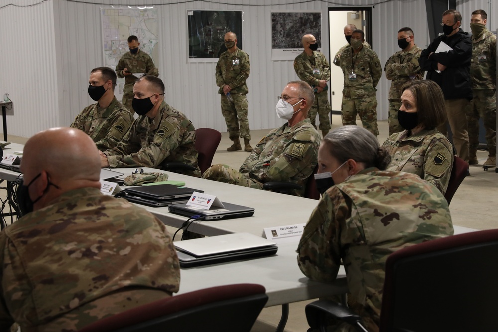 Maj. Gen. Michael C. O' Guinn is briefed about Exercise Guardian Response 21