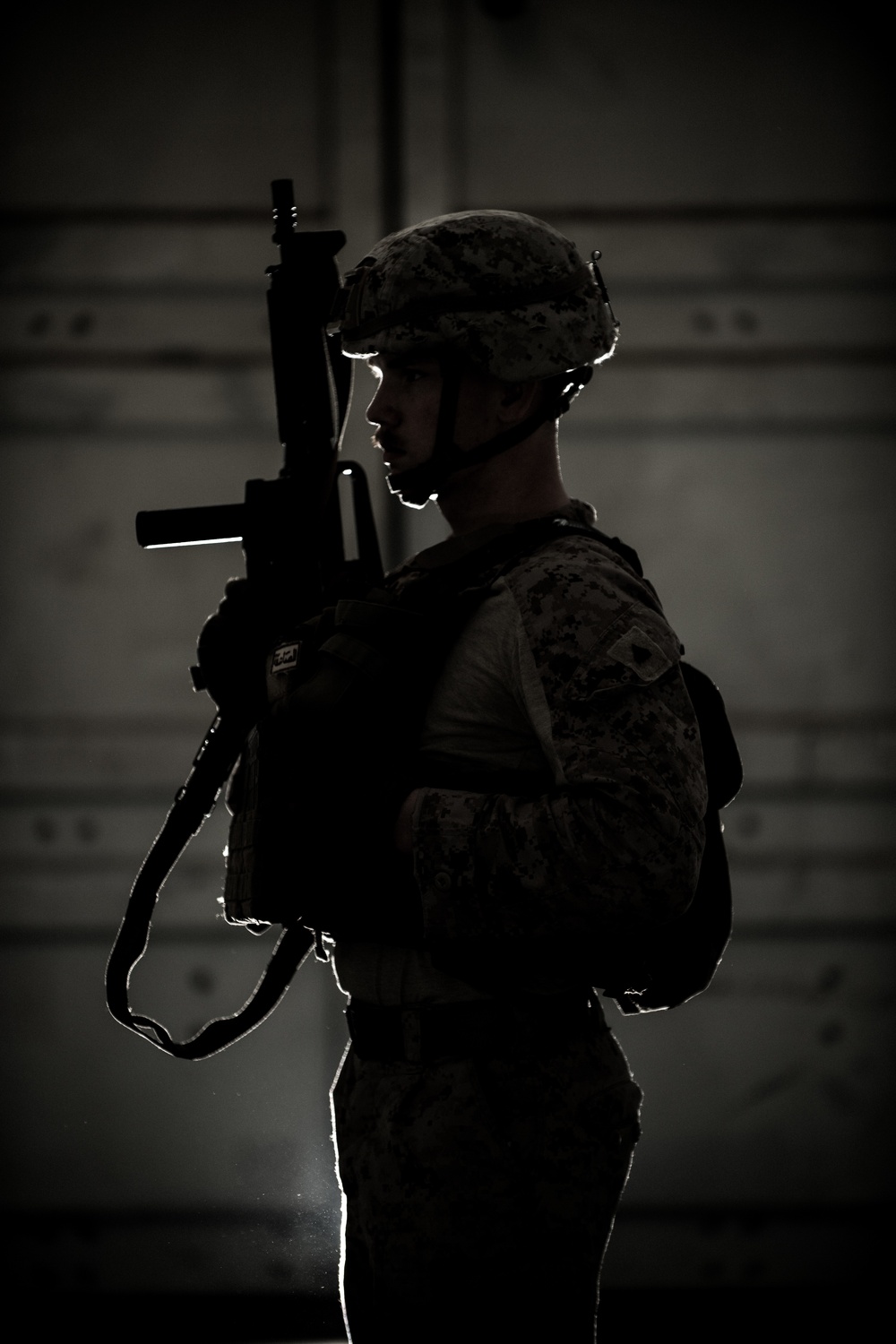 FASTCENT Marine Poses For Portraits After CQB Training 