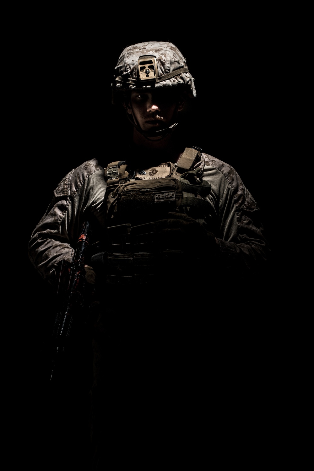 FASTCENT Marine Poses For Portraits After CQB Training 