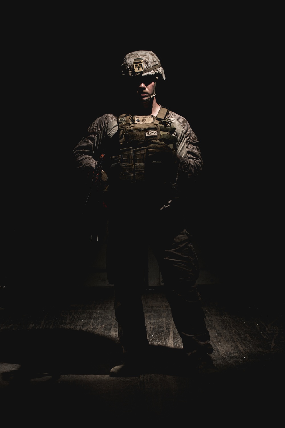 FASTCENT Marine Poses For Portraits After CQB Training 