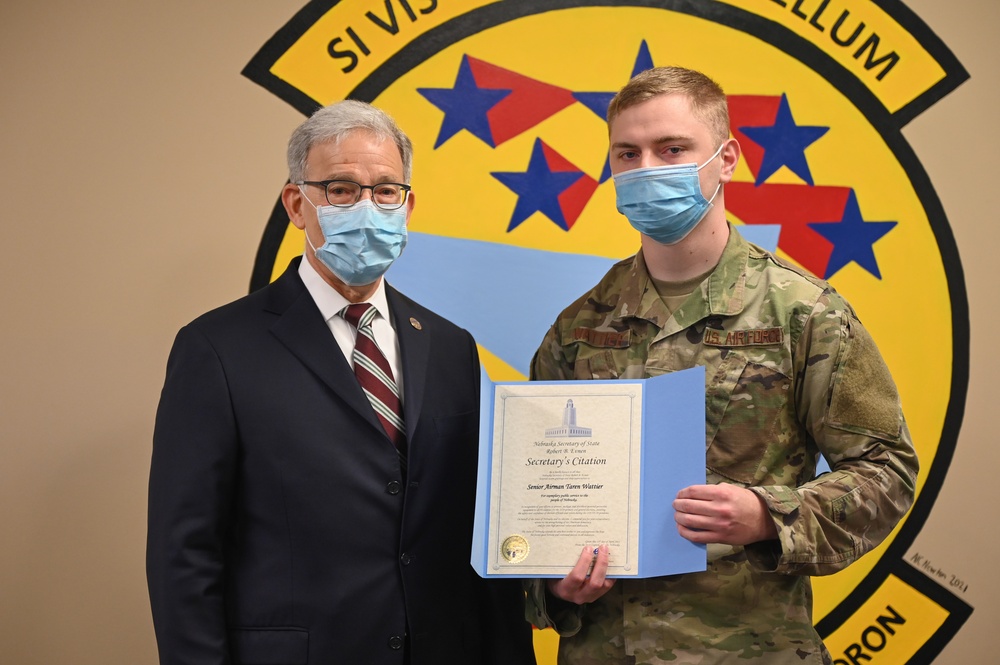 Airman receives award from Secretary of State from work during general and primary elections