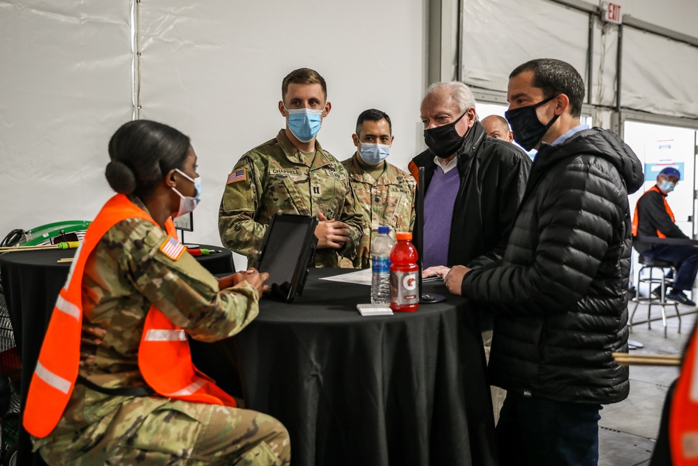 Jim Bland and Steven Herman, Civilian Aides to the Secretary of the Army visit the United Center COVID-19 Community Vaccination Center, Chicago