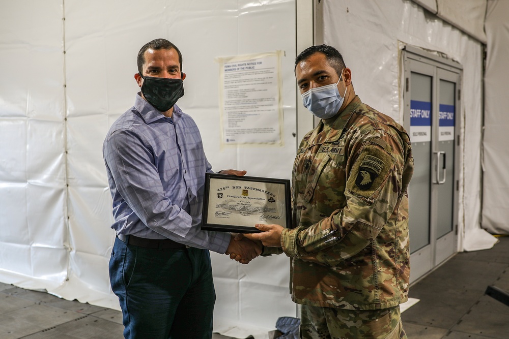Jim Bland and Steven Herman, Civilian Aides to the Secretary of the Army visit the United Center COVID-19 Community Vaccination Center, Chicago