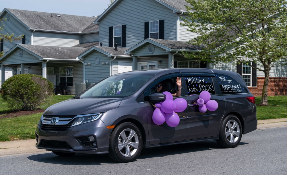 Teachers, faculty parade through housing celebrating Dover AFB military children