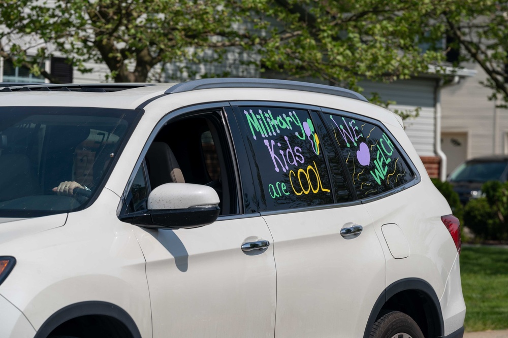 Teachers, faculty parade through housing celebrating Dover AFB military children