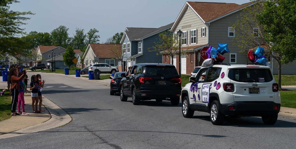 Teachers, faculty parade through housing celebrating Dover AFB military children