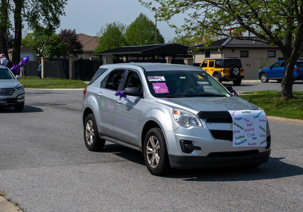 Teachers, faculty parade through housing celebrating Dover AFB military children