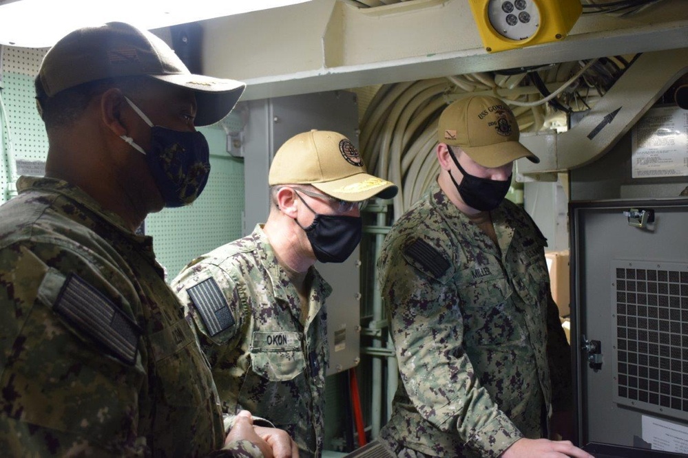 Rear Adm. John Okon to USS Gonzalez