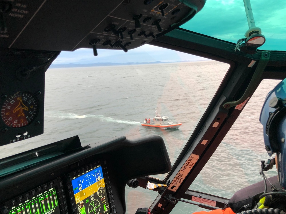 Coast Guard saves 2 from capsized boat near Freshwater Bay, WA