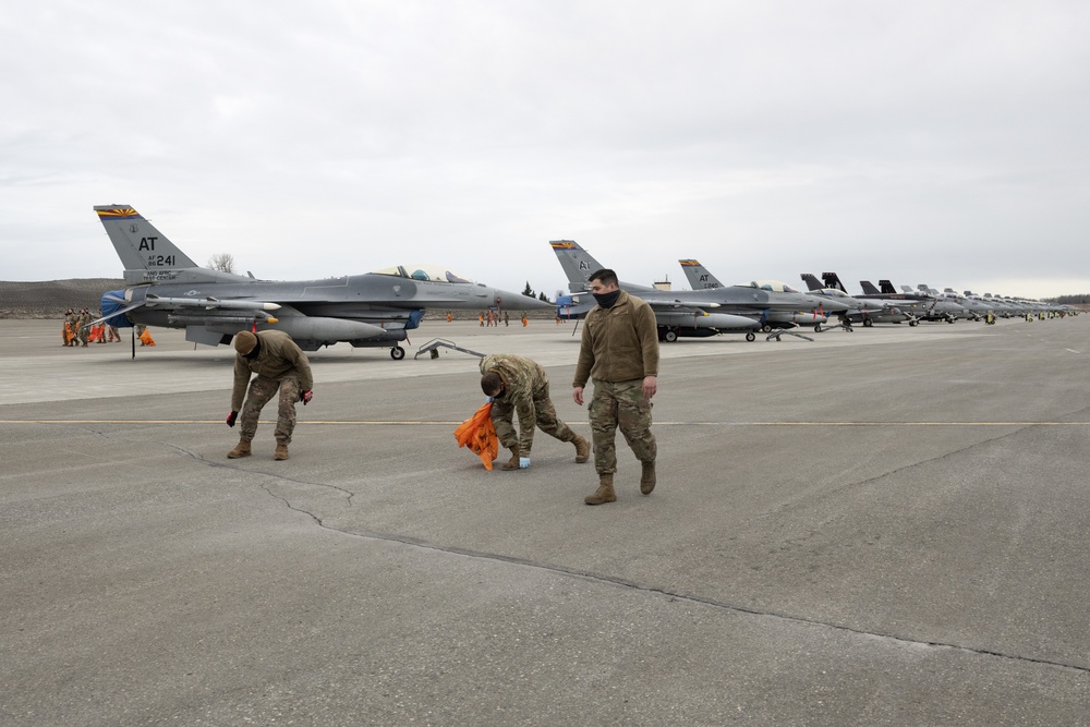 JBER Airmen conduct foreign object debris walk