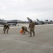 JBER Airmen conduct foreign object debris walk