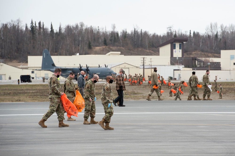 JBER Airmen conduct foreign object debris walk