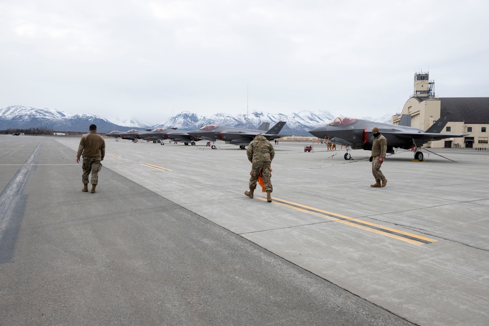 JBER Airmen conduct foreign object debris walk