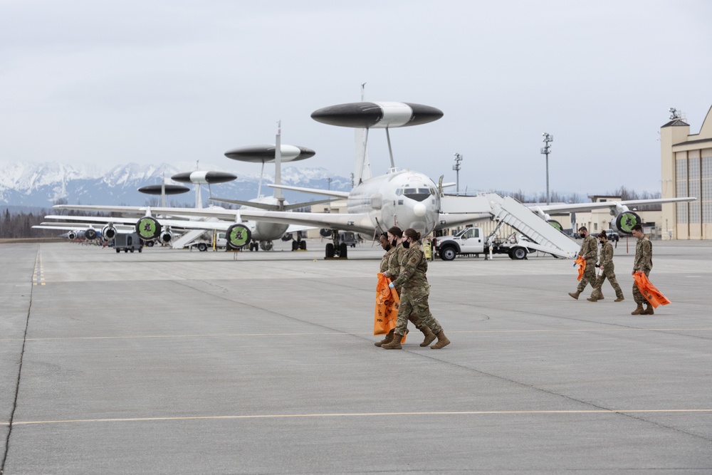 JBER Airmen conduct foreign object debris walk