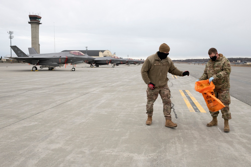 JBER Airmen conduct foreign object debris walk