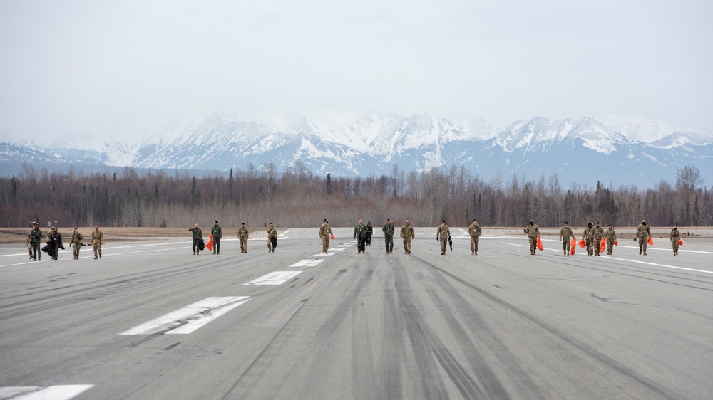 JBER Airmen conduct foreign object debris walk