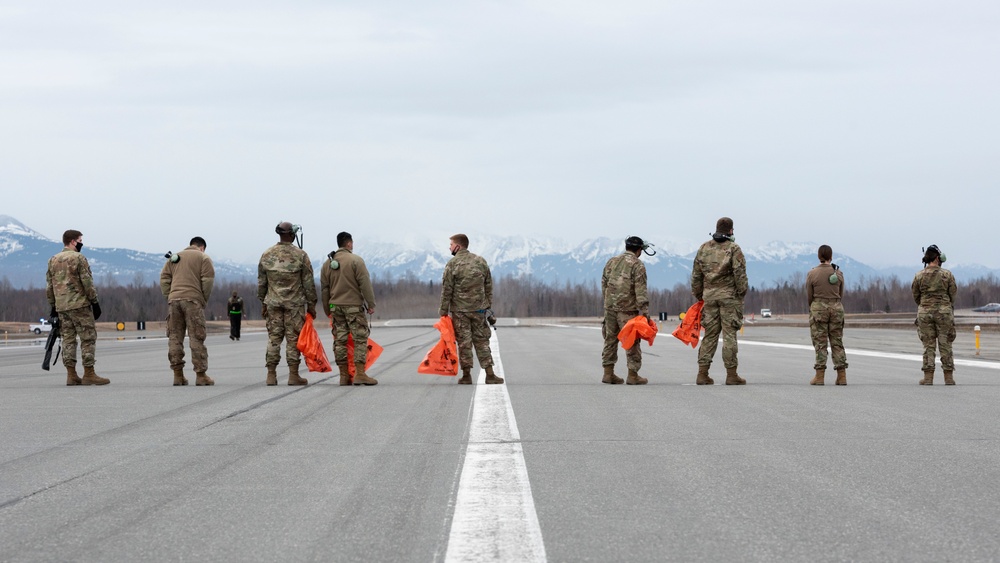 JBER Airmen conduct foreign object debris walk