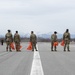 JBER Airmen conduct foreign object debris walk