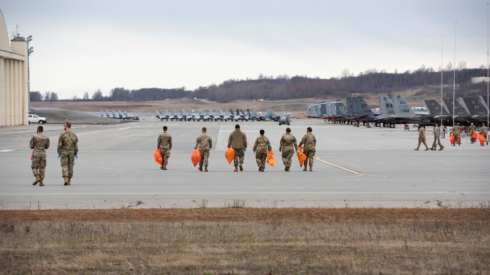 JBER Airmen conduct foreign object debris walk