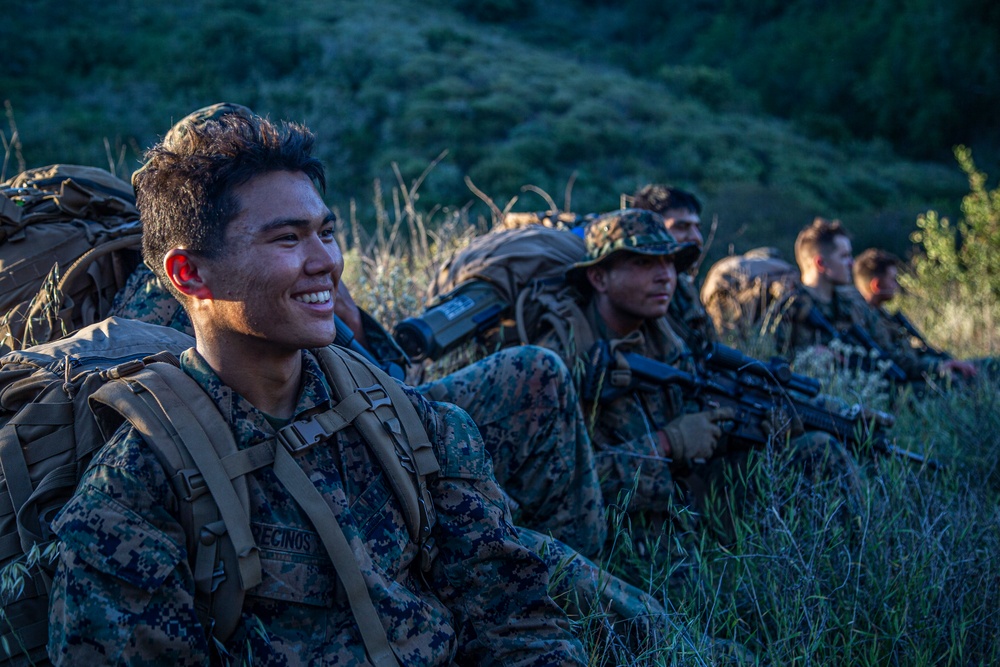 IMC Marines finish capstone exercise, hike straight to their graduation ceremony