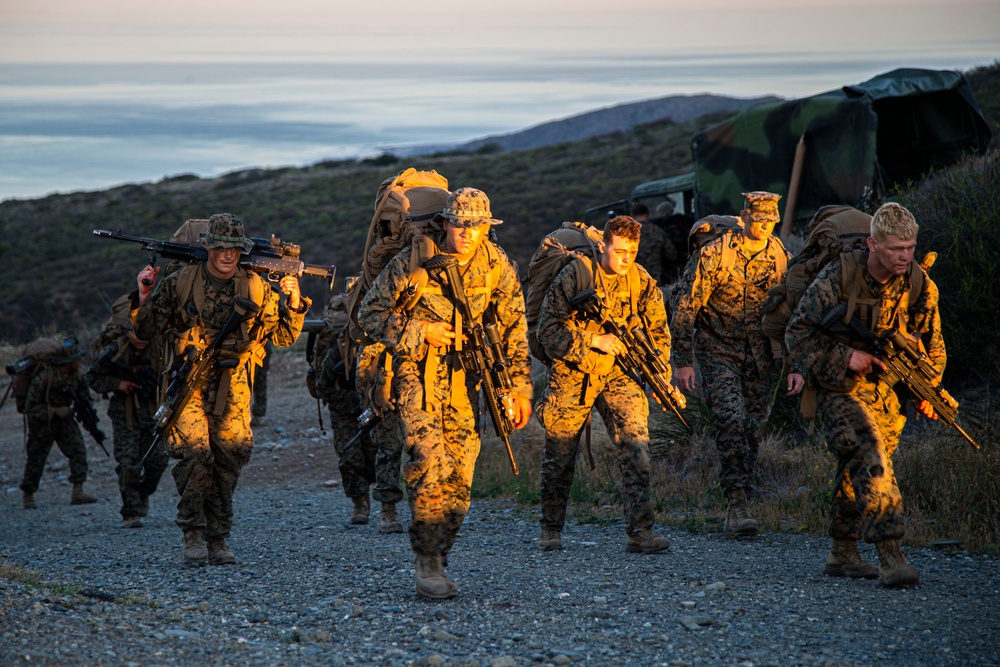 IMC Marines finish capstone exercise, hike straight to their graduation ceremony