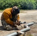 NMCB 11 Repairs Gate Arm for Known Distance Range on Naval Base Guam