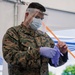 US Marine Senior Enlisted Advisor Vaccinates US Navy Officer