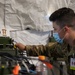 44 Medical Brigade Radio Operator Conducts Communication Checks During GR 21