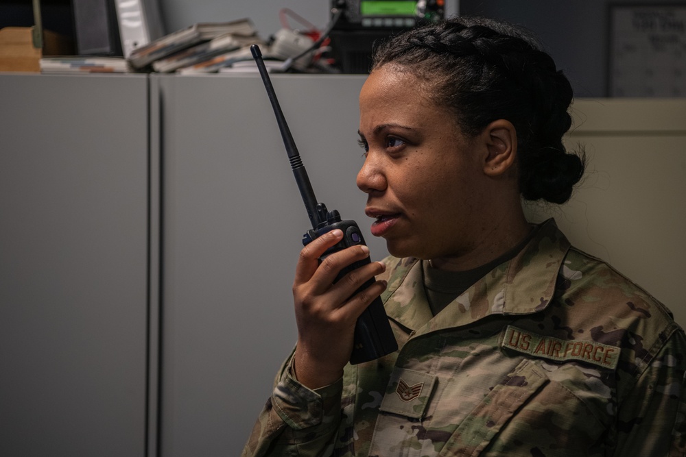 Staff Sgt. Lesley VanderWoude Takes a Radio Transmission at the 110th Wing