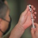 Medics distribute next batch of COVID-19 vaccines
