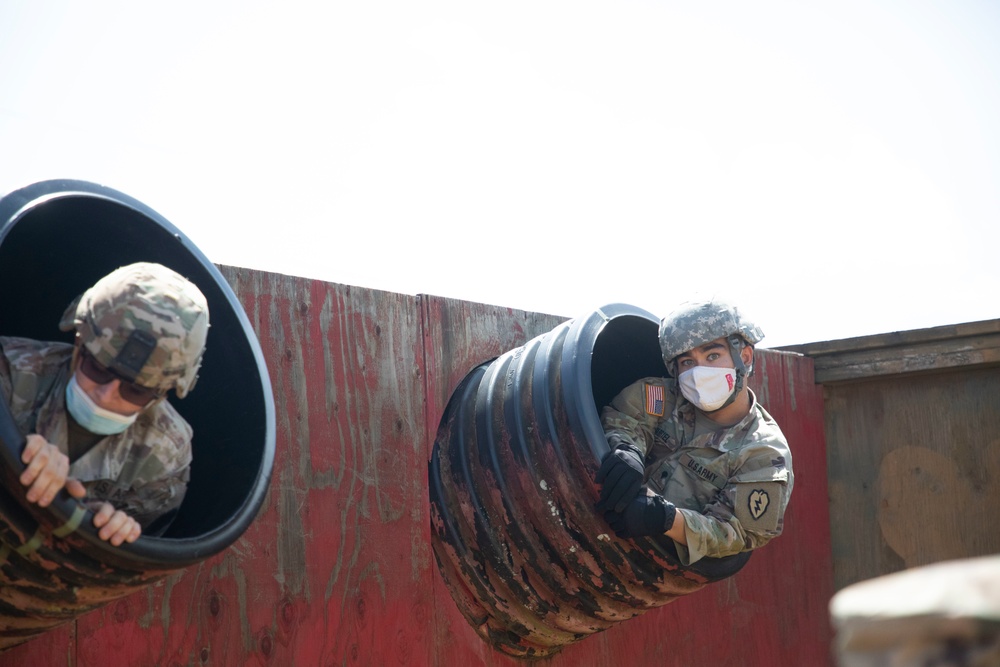 25th CAB Soldiers use teamwork to tackle the Leader Reaction Course