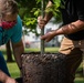 Airmen, children plant tree for Arbor Day