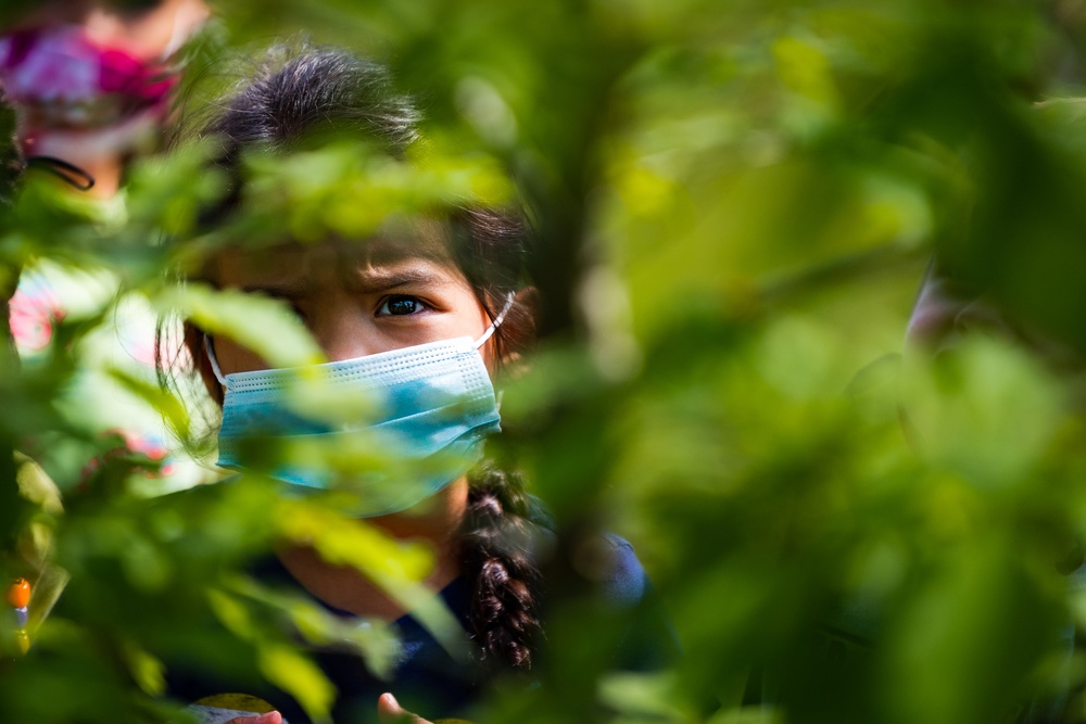 Airmen, children plant tree for Arbor Day