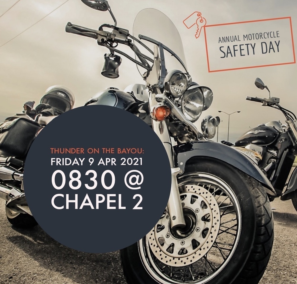 This is a promotional flyer for an Annual Motorcycle Safety Day event called 'Thunder on the Bayou.' The event is scheduled for Friday, April 9, 2021, at 0830 hours at Chapel 2. The background features a low-angle close-up photograph of cruiser-style motorcycles with chrome detailing.