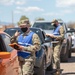 2nd Stryker Brigade Combat Team, 4th Infantry Division Soldiers vaccinate members of the Pueblo community