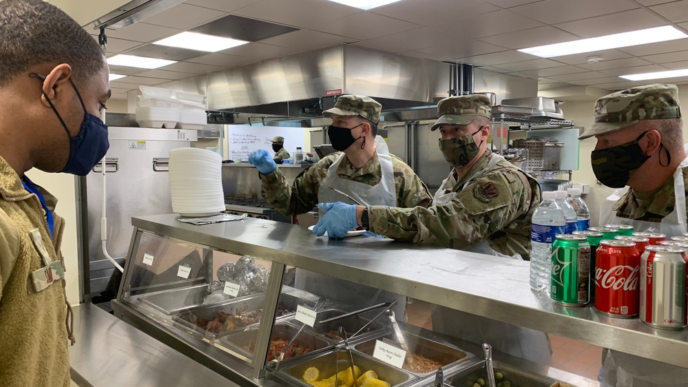 111th ATKW Commander serves chow, meets troops