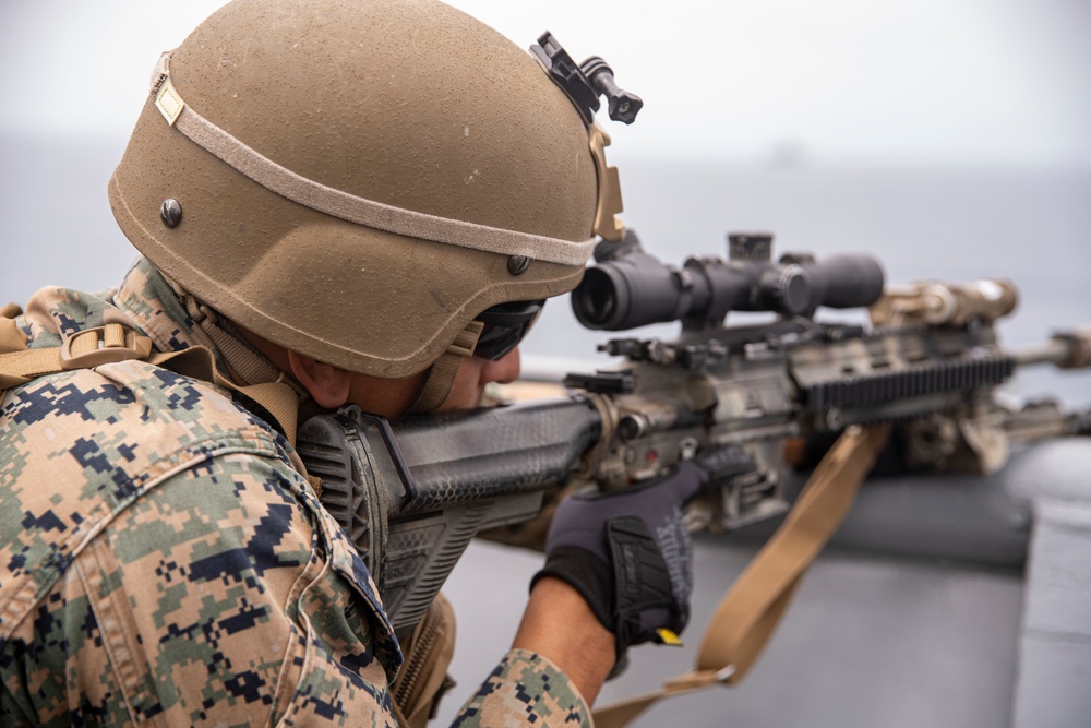 U.S. Marines aboard USS Pearl Harbor provide security during strait transit training