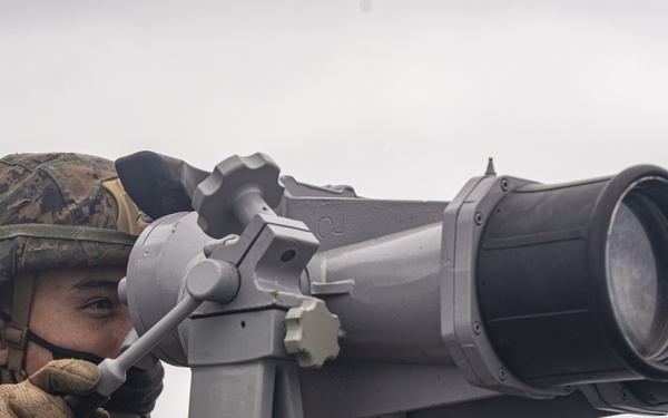 U.S. Marines aboard USS Pearl Harbor provide security during strait transit training