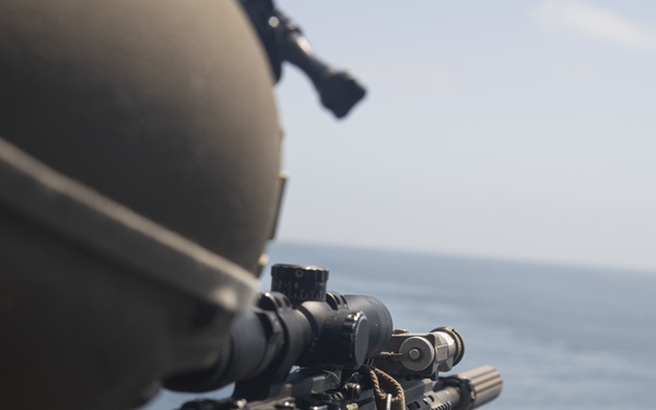 U.S. Marines aboard USS Pearl Harbor provide security during strait transit training