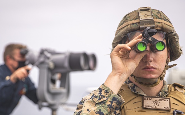 U.S. Marines aboard USS Pearl Harbor provide security during strait transit training