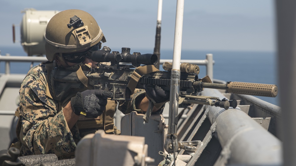 U.S. Marines aboard USS Pearl Harbor provide security during strait transit training