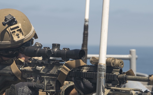 U.S. Marines aboard USS Pearl Harbor provide security during strait transit training